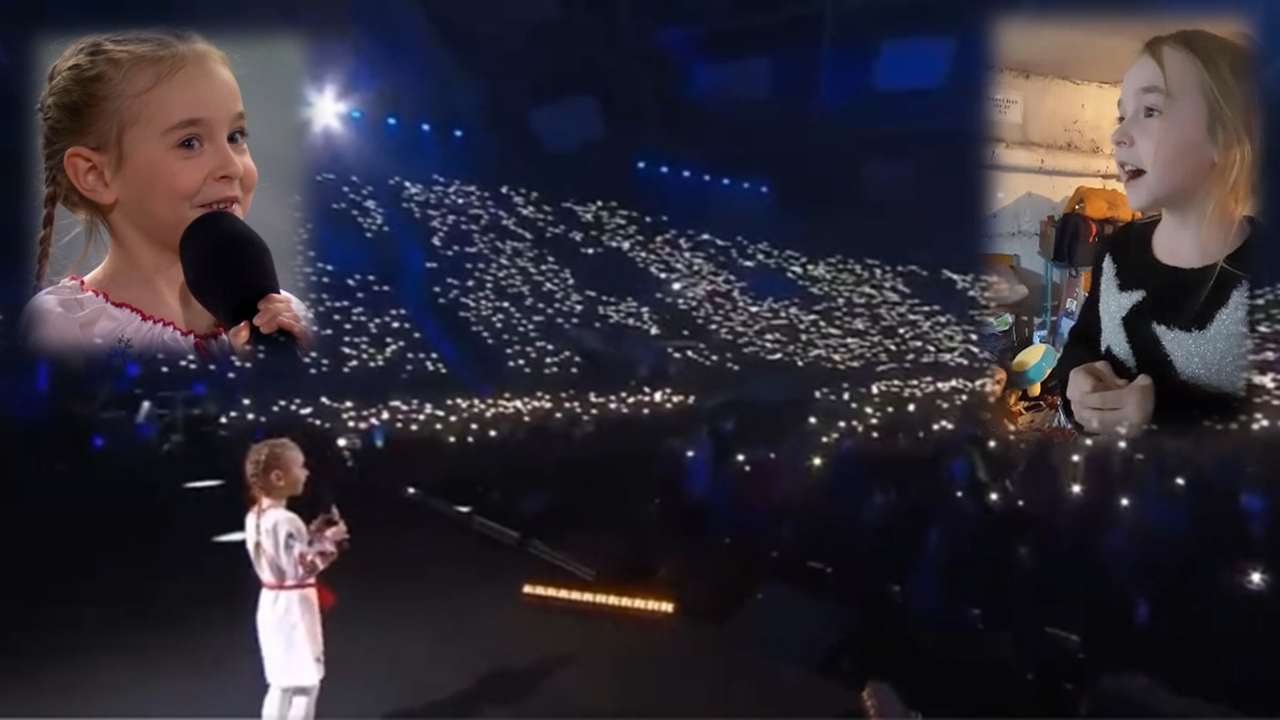 La petite ukrainienne de 7 ans qui chantait dans un bunker de Kiev récidive dans un stade polonais comble.